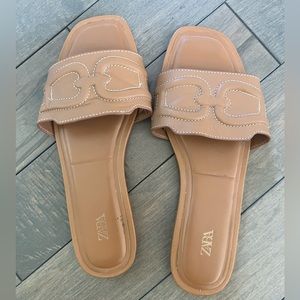 Brown faux leather slides